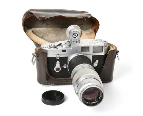 Leica M2 Camera no.1099492 with Leitz Hektor f4.5 135mm lens, in leather case Some scuffing to top of camera, some clouding t