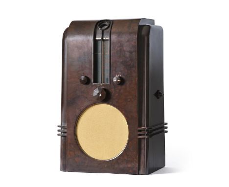 A Good Ekco Type AC97 'The Robot' Wireless Receiver,  1936, the brown bakelite cased version, with central magic eye tuning, 