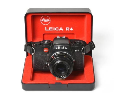 Leica R4 Camera no.1579182 with Leitz Summicron-R f2 50mm lens, with display case Significant dent to front rim of lens, lens