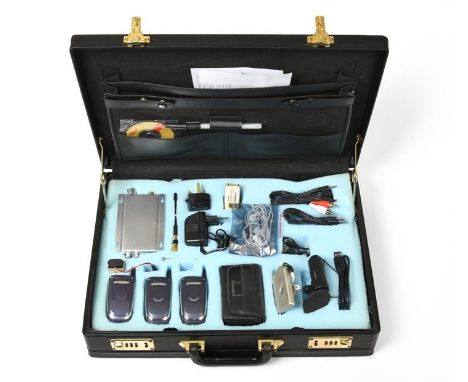 Spy Camera Kit  combination briefcase containing three plastic cameras in the form of Motorola phones, audio recorder, radio 