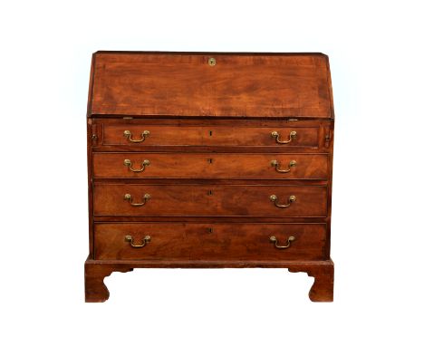 A George III mahogany bureau, the cross banded fall enclosing a fitted interior with central shaped panelled cupboard flanked