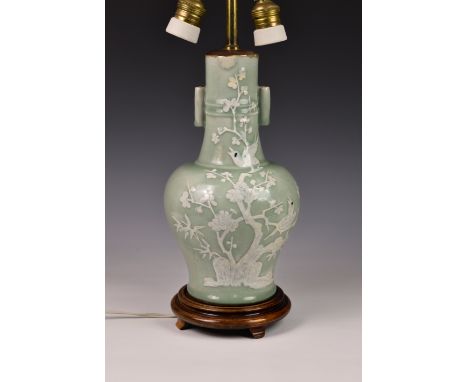 A Chinese celadon white slip glazed porcelain vase, later converted to table lamp, probably 19th century, of globular form wi