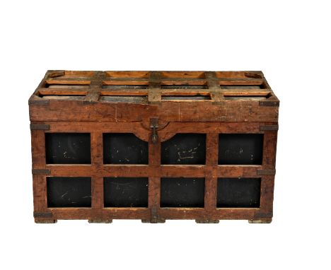 A large and unusual metal steamer trunk in slatted wooden cage, c.1900, the black painted trunk with dark blue interior, the 