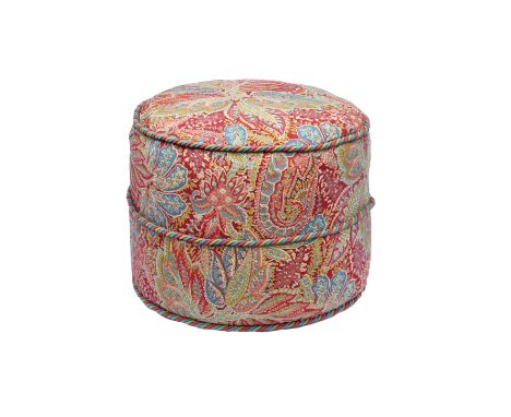A circular paisley upholstered pouffe, modern, 17½in. (44.5cm.) diameter, 14in. (35.5cm.) high. 