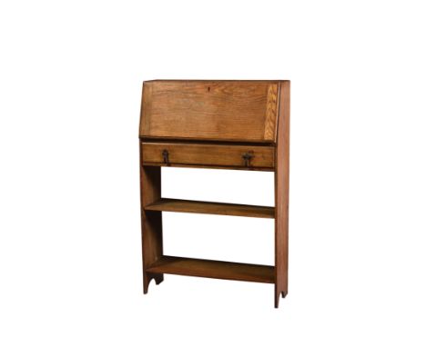 A 1920s stripped light oak student's bureau, the upright fall enclosing a fitted interior, over a single drawer and two books