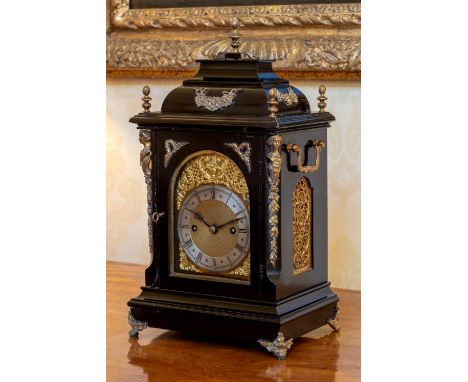 A Victorian ebonised and gilt brass mounted quarter striking bracket clock, by Winterhalder & Hofmeier, the lacquered brass d