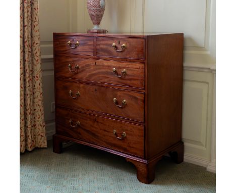 A George III mahogany straight front chest, the rectangular top over two short and three long graduated drawers, with later s