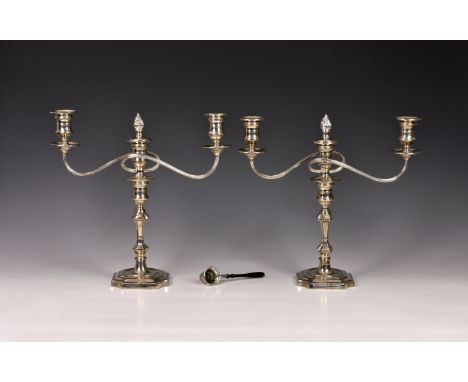 A pair of Georgian style silver three-light candelabra, Barker Ellis Silver Co, Birmingham 1974, of typical form with taperin