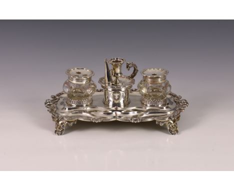 A William IV silver ink stand, Joseph Angell I &amp; John Angell I, London 1832, the shaped stand with central scalloped cham