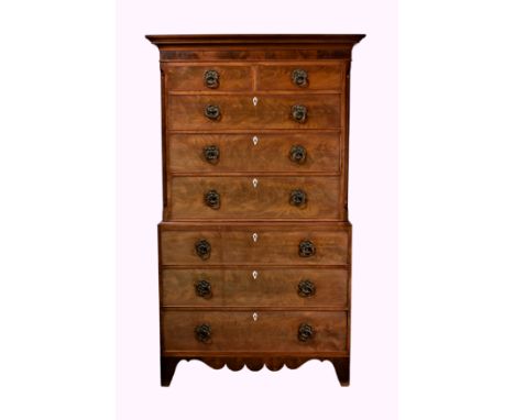 A late-Regency Channel Islands mahogany chest on chest, the flared cornice over two short and three long graduated drawers wi