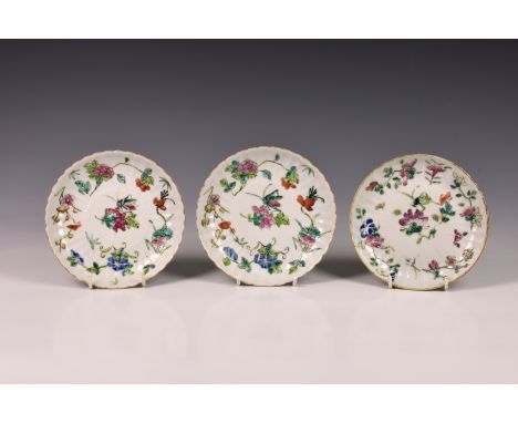 Three Chinese famille rose porcelain saucers, 19th century or earlier, of circular form with ribbed sides and rim, each paint