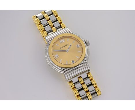 A gentleman's Boucheron 'Solis' stainless steel and 18ct gold wrist watch, with interesting provenance, having been presented