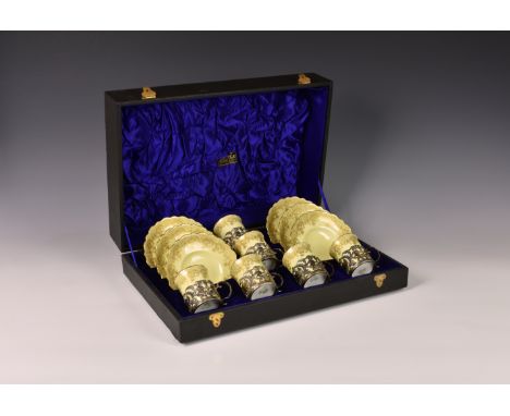 A cased Edwardian silver mounted Aynsley coffee set, the silver mounts by William Hutton &amp; Sons Ltd, London 1905, decorat