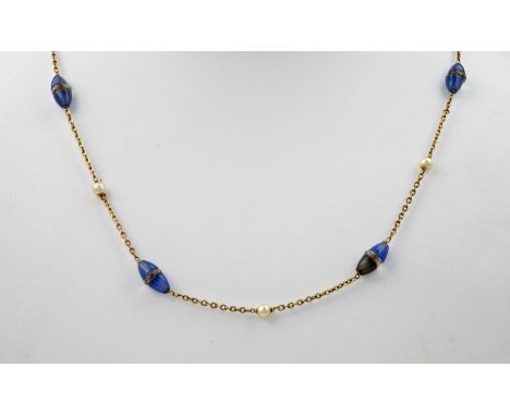 A 9ct yellow gold, seed pearl and blue bead necklace, the blue beads measuring approximately 10mm in length and suspended int