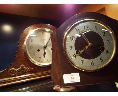 A 1930's art deco Smith's Enfield Bakelite mantle clock together with and oak cased Wellington hat clock