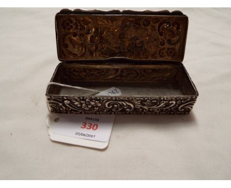 A Chester 1904 silver embossed hair pin box decorated with pan playing pipes, scrolls and acanthus 