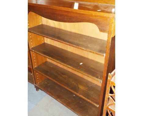 An art nouveau style oak bookcase with four shelves
