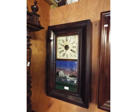 A 19thC mahogany cased American wall clock, the enamel dial above a pictorial glazed panel inscribed 'Branksea Castle, Dorset