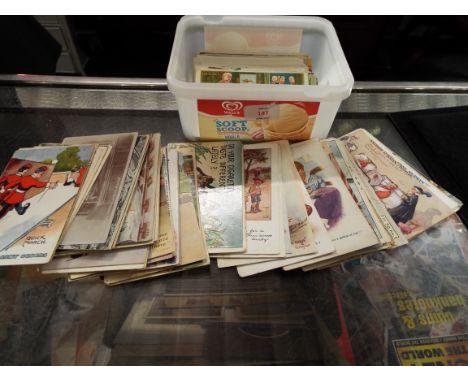 A selection of vintage comical postcards 