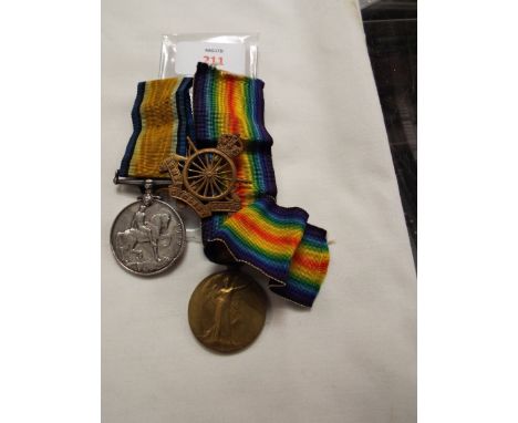 A pair of WWI and Cap badge awarded to 5579 Pte E.J. PORTER Army Cyclist Corps