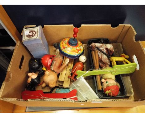 A box of assorted vintage toys including a 1930's Fisher-Price Tailspin Tabby similar Pluto, Minnie Mouse speaking toy Chad V
