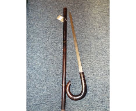 An inlaid rosewood sword stick