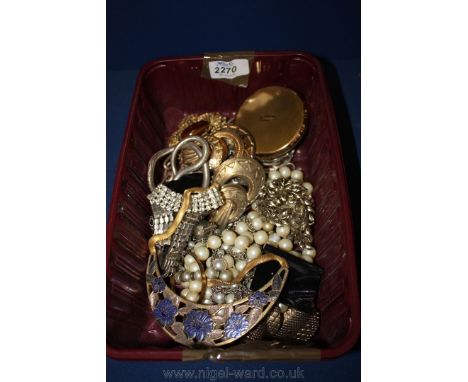 A quantity of miscellaneous costume jewellery including Earrings, Brooches, Necklaces and a Stratton Compact.