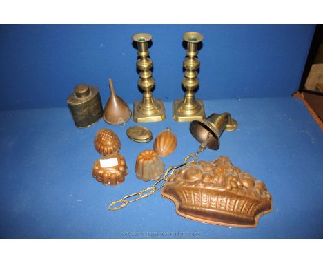 Miscellaneous Copper Moulds, Brass tea caddy, pair of brass candlesticks, copper funnel, etc.