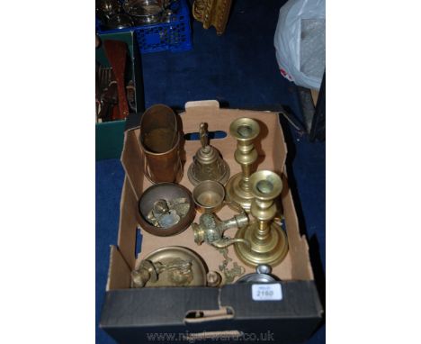 A quantity of brass and metals including a brass Bell, pewter Chamber Stick, a pair of brass Candlesticks