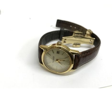 An 18k gold handmade Dreyfuss &amp; co watch. Complete with the original box and certificated.