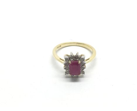 A 9ct gold set with a rectangular ruby surrounded by a halo of diamonds, ruby approx 1.51ct, diamonds approx 0.06ct, approx t