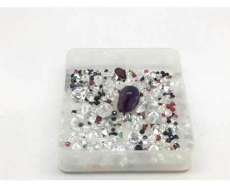 A collection of loose mixed stones including amethyst, cubic zirconia, garnet, sapphire and ruby, approx 104.05ct.
