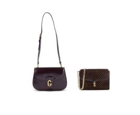 TWO BROWN SHOULDER BAGSGucci, 1970sThe first in smooth brown leather, 25cm wide, 17cm high, 41cm shoulder drop; the second in