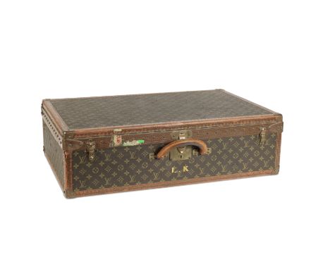A MONOGRAM ALZER 75 SUITCASELouis VuittonMonogram canvas and leather trim, brass hardware, removable interior tray, monograme