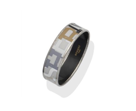 A BROWN ENAMEL SIGNATURE WIDE BANGLEHermèsSilver tone mountsCondition Grade C6cm interior width, 1.9cm highFor further inform
