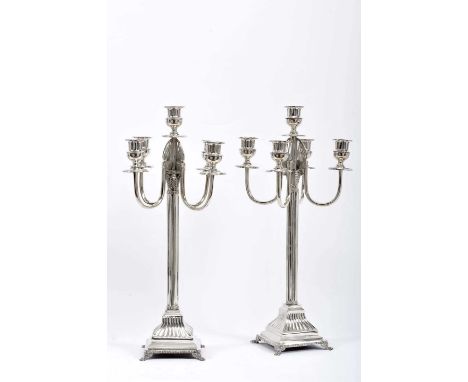 A pair of five-light candelabra, Art Deco, 833/1000 silver, ribbed and pierced decoration en relief, zoomorphic feet, Portugu