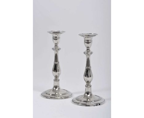 A pair of candlesticks, D. Maria I, Queen of Portugal (1777-1816), 833/1000 silver, striated friezes, Portuguese, late holes 