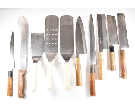 Eight Japanese knives / choppers / spatulas, five with signed blades, spatulas by Monogram, Victorinox carving knife and an u