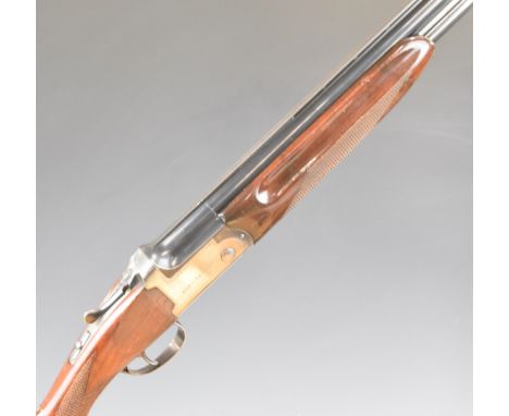 AYA Yeoman 12 bore over under ejector shotgun with named and border engraved locks, chequered semi-pistol grip and forend, ve