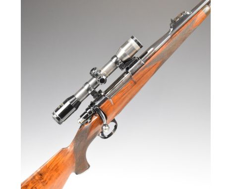 John Rigby &amp; Co .275 bolt-action sporting rifle with chequered grip and horn tipped forend, pop-up sights, adjustable tri