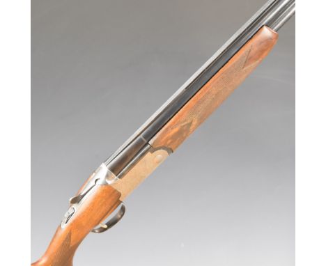 Lincoln 12 bore over and under ejector shotgun with engraved scenes of dogs and birds to the locks, engraved underside, trigg