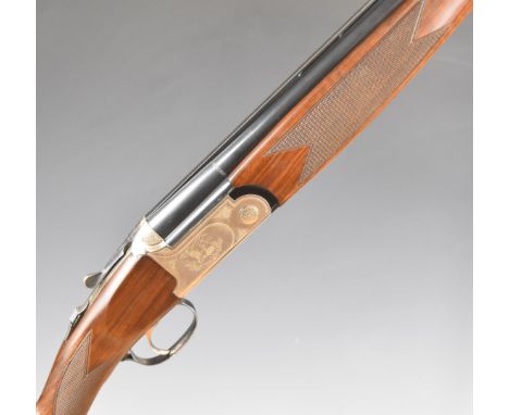 Fair LX600 12 bore over and under ejector shotgun with engraved scenes of birds to the locks and underside, chequered grip an