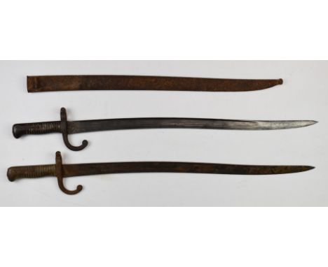 Two Yataghan bayonets, one with scabbard the other in relic condition, longest blade 57cm.&nbsp;PLEASE NOTE ALL BLADED ITEMS 