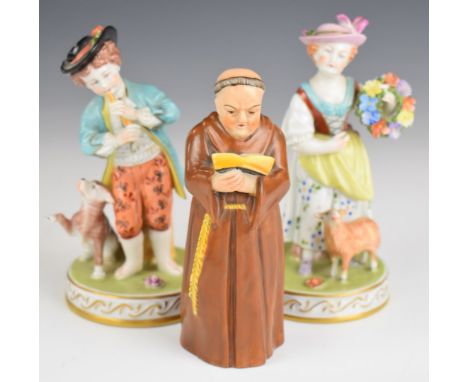 Two Dresden figures and a Royal Worcester monk candle snuffer, tallest 13.5cm