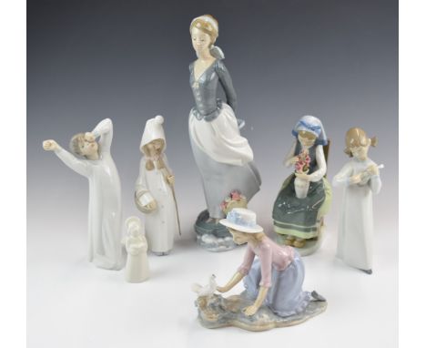 Six Lladro and Nao figures with a Copenhagen figure, tallest 33cm