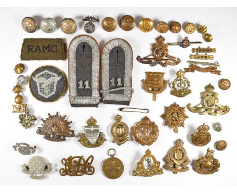 A small collection of badges including Australian Commonwealth military forces, Northumberland Fusiliers, Royal Marines and A