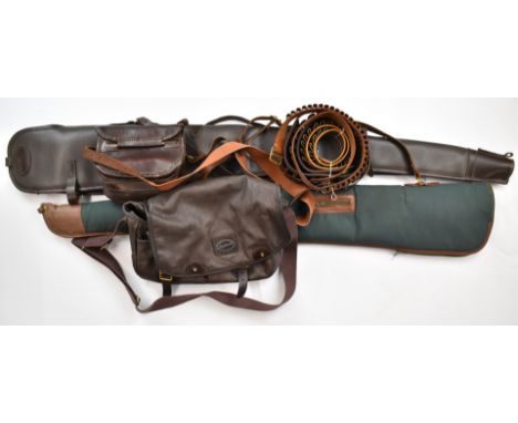 A collection of shotgun accessories comprising two padded or wool lined gun slips, a leather cartridge bag, Ogden's game bag 