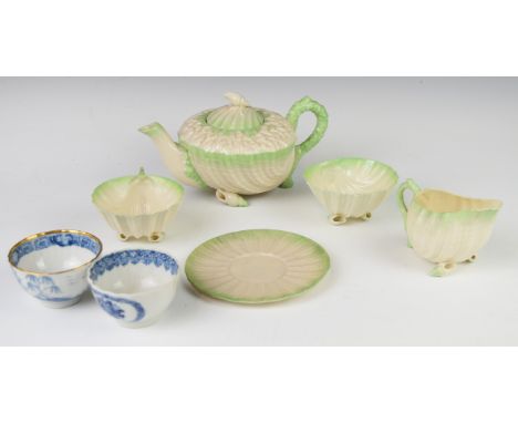 Belleek nautilus shell tea for one and two first period Worcester tea bowls, tallest 12cm