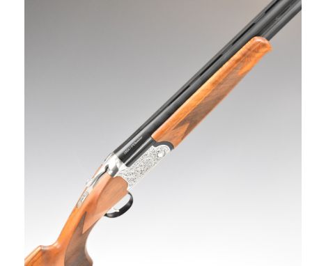 Kofs Zenith 12 bore over and under ejector shotgun with engraved locks and underside, chequered semi-pistol grip and forend, 