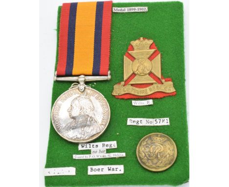 British Army Queen's South Africa Medal 1899 named to 5781 Pte E Ryan, Wiltshire Regiment, with hat badge and button
